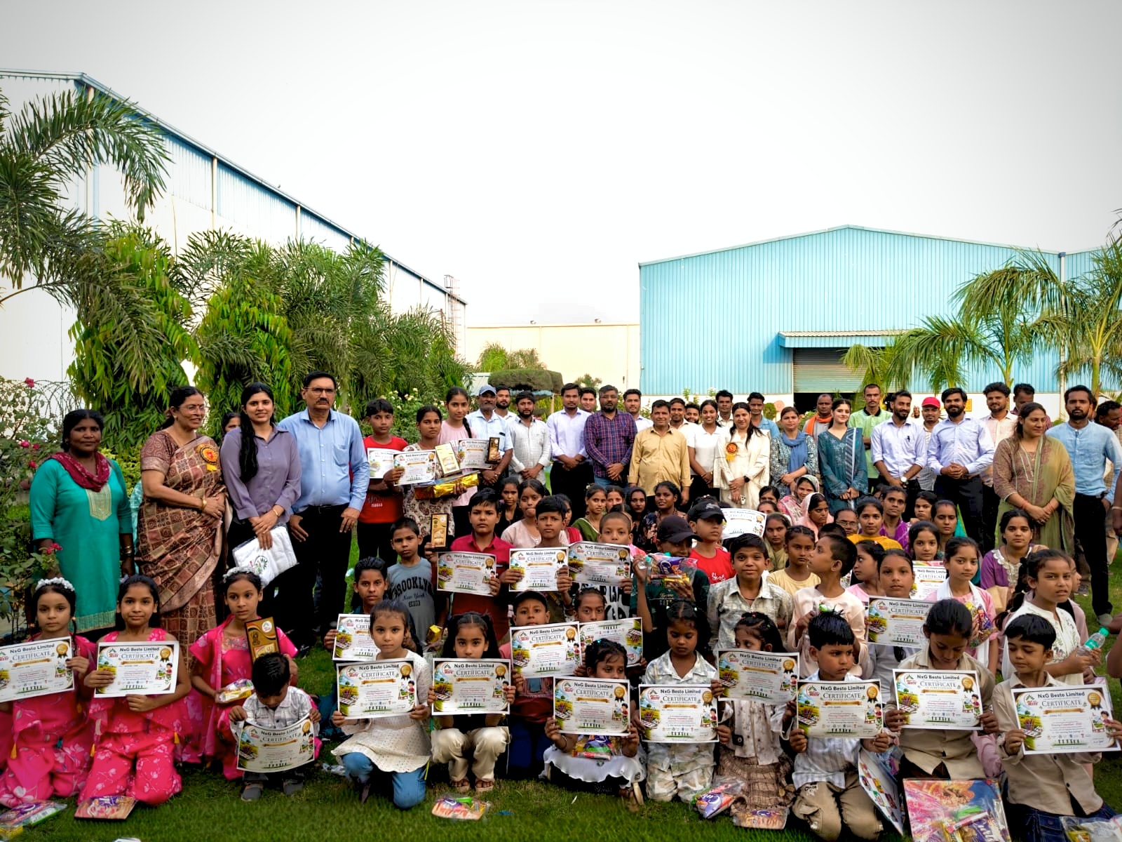 Children receiving certificates and prizes at NxG Besto Drawing Competition 2026